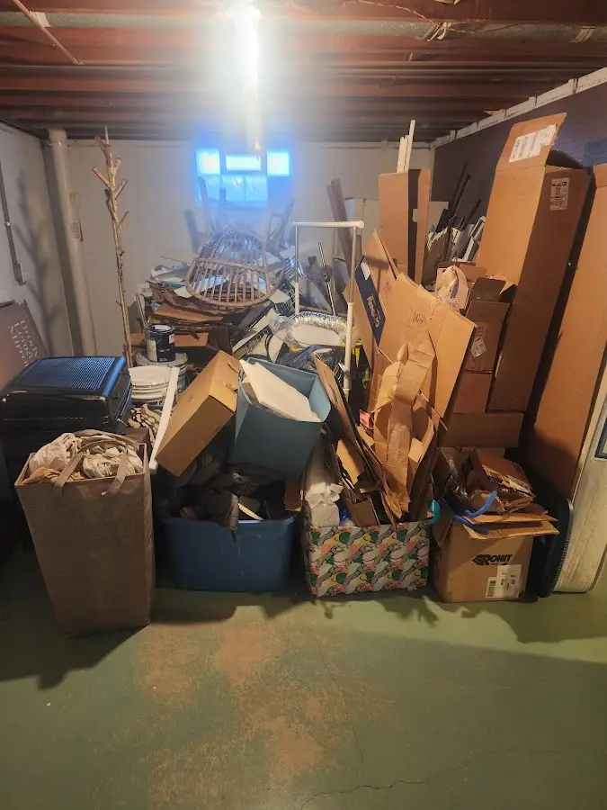 Roll-off dumpster container at job site for 4 Yard Dumpster Rental in Forest City